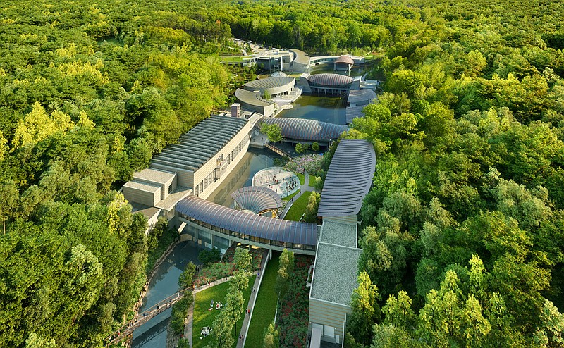 This artist’s rendering, an aerial view looking south, shows the planned 100,000-square-foot expansion of Crystal Bridges Museum of American Art in Bentonville. The project will increase gallery space by 65% and provide education and studio areas, another cafe and “spaces for refl ection and gathering.”
(Special to the Democrat-Gazette)