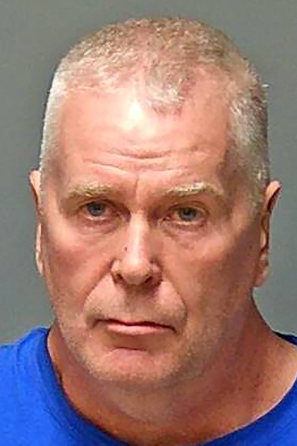 This undated handout booking photo provided by the New Hampshire Attorney General's office shows James Woodlock, one of six men arrested Wednesday, April 7, 2021, in connection with sexual abuse allegations at New Hampshire's state-run youth detention center, the attorney general's office said. (New Hampshire Attorney General's Office via AP)