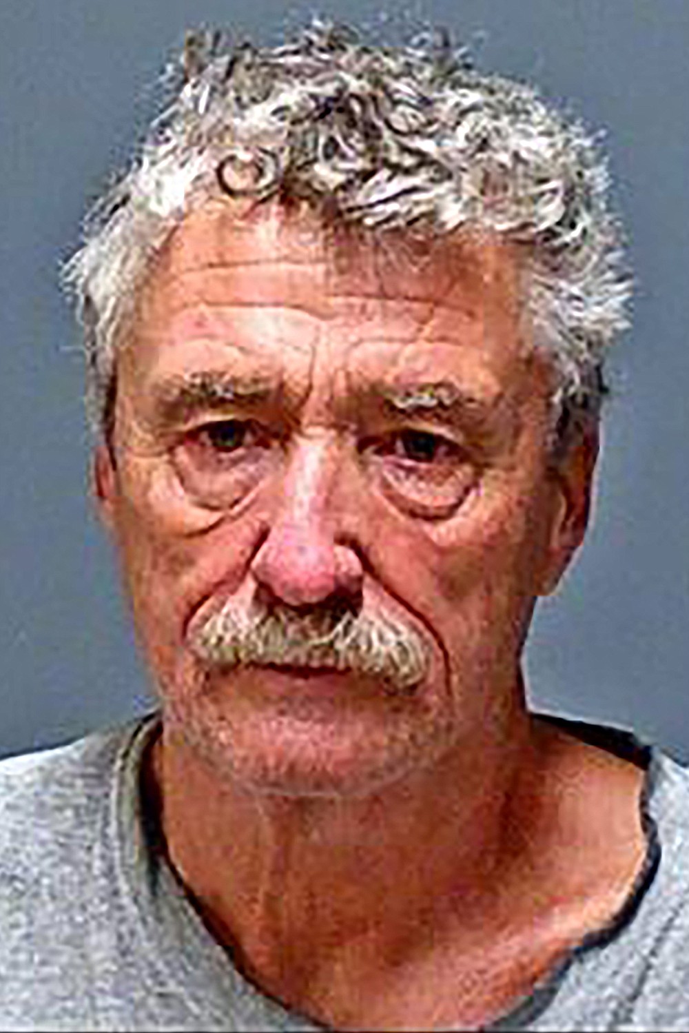 This undated handout booking photo provided by the New Hampshire Attorney General's office shows Bradley Asbury, one of six men arrested Wednesday, April 7, 2021, in connection with sexual abuse allegations at New Hampshire's state-run youth detention center, the attorney general's office said. (New Hampshire Attorney General's Office via AP)