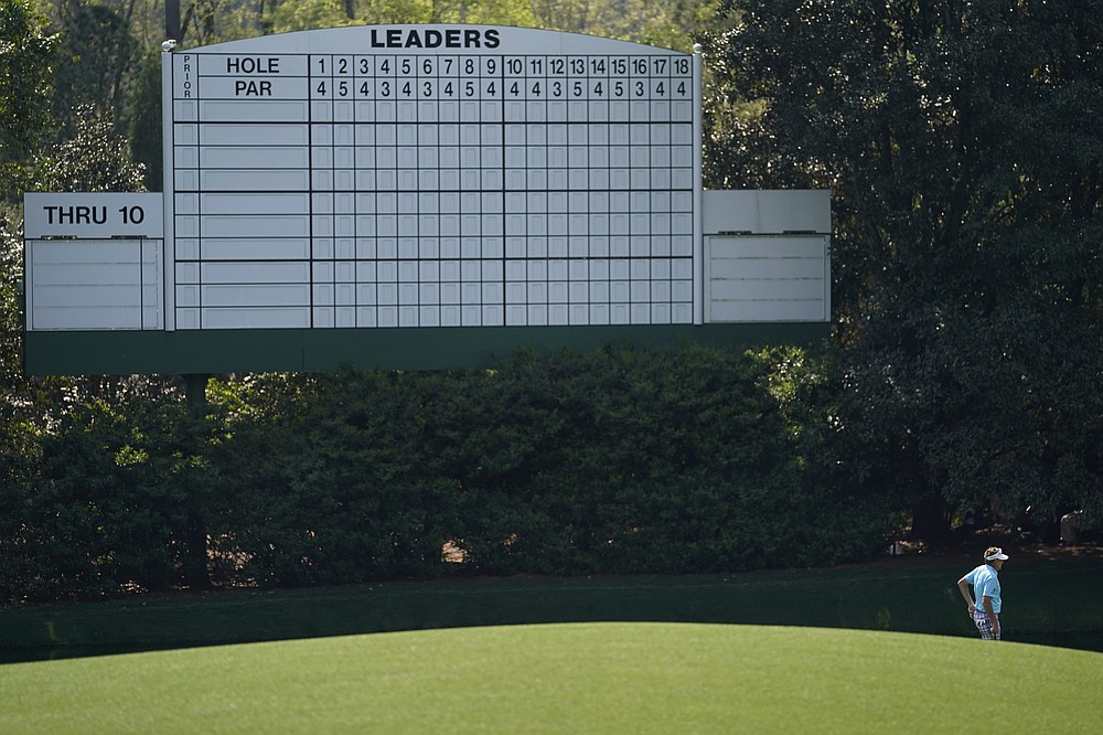 Ian Poulter, of England, waits to putt on the 11th hole during a practice round for the Masters golf tournament on Wednesday, April 7, 2021, in Augusta, Ga. (AP Photo/David J. Phillip)