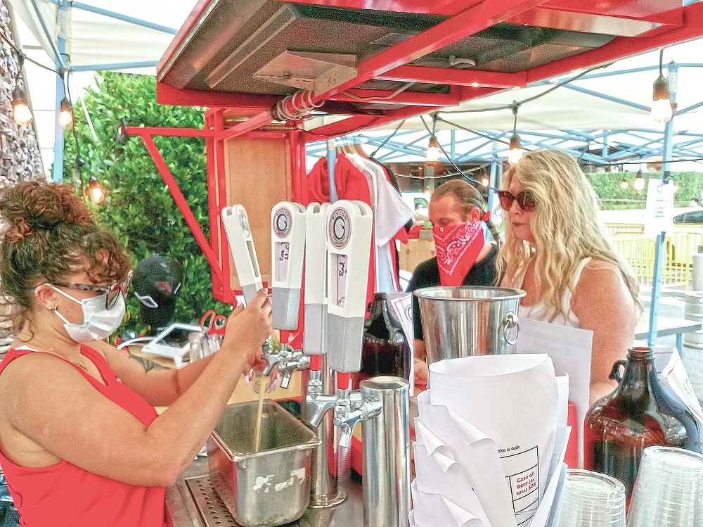 This Sept. 5, 2020, photo shows the outdoor beer garden at the Rincon Reservation Road Brewery, owned by the Rincon Band of Luiseño Indians, in Valley Center, Calif. The beer garden opened in August with COVID-19 precautions, while the full operation reopened a few months later. (Sean Curry/Indian Country Today via AP