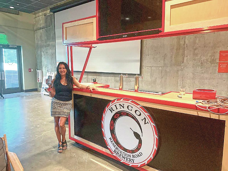 This Aug. 25, 2020, photo shows Rincon Economic Development Corp. Chairperson Ruth-Ann Thorn inside the Rincon Reservation Road Brewery in Valley Center, Calif. Rincon Reservation Road Brewery sits tucked next to Harrah's Resort just north of San Diego, ready to serve up craft beer with a side of culture. As Southern California's first craft brewery on tribal lands, 3R Brewery, as it's known, aims to educate beer lovers about the Rincon Band of Luiseño Indians and inspire young tribal members with a passion for hops.(Sean Curry/Indian Country Today via AP