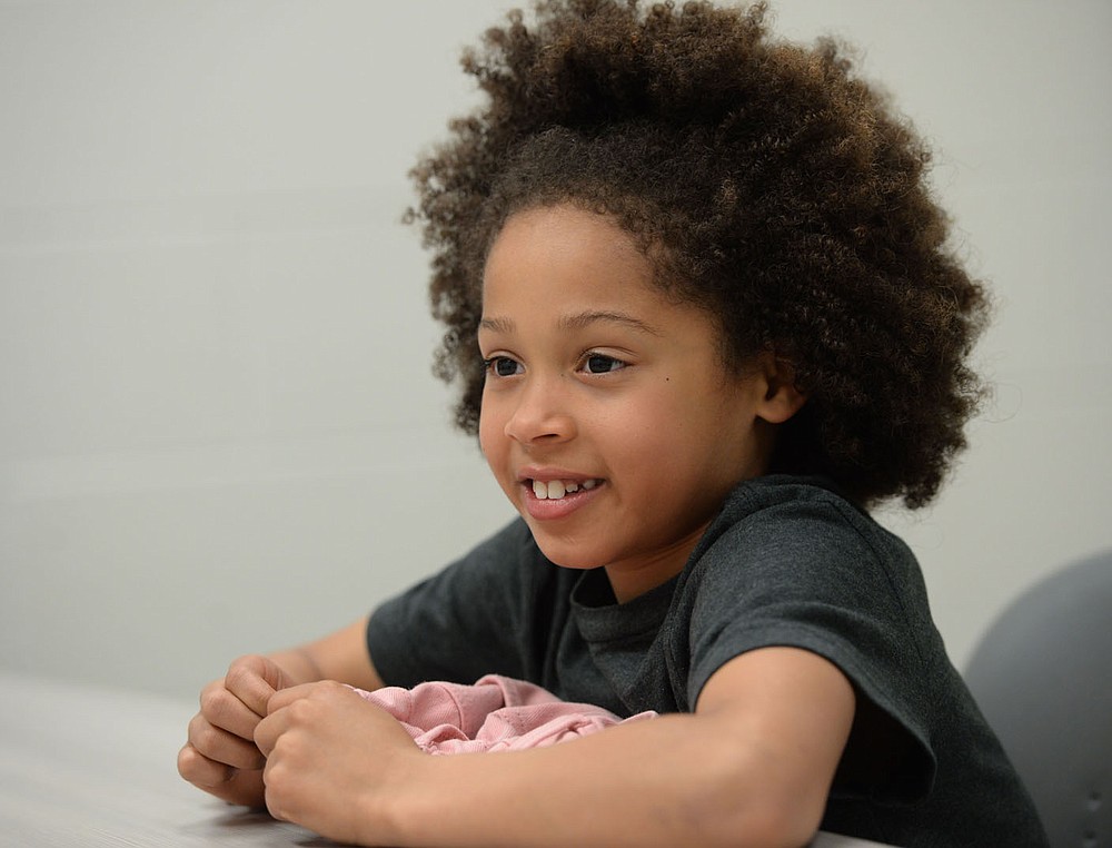 Kamryn Gardner, 7, a first-grader at Evening Star Elementary School in Bentonville, speaks Wednesday, April 7, 2021, at the school. Kamryn wrote a letter to Old Navy about the lack of working pockets on girl’s jeans. They responded by sending her several pairs with pockets she can use. Visit nwaonline.com/210408Daily/ for today's photo gallery.
(NWA Democrat-Gazette/Andy Shupe)