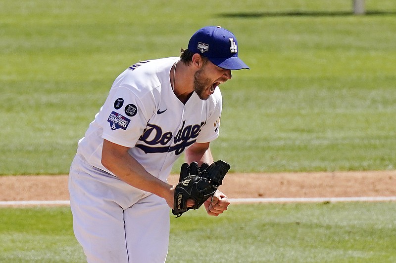 Los Angeles Dodgers starting pitcher Clayton Kershaw celebrates after striking out Washington Nationals' Jordy Mercer to end the top of the sixth inning of a baseball game Sunday, April 11, 2021, in Los Angeles. (AP Photo/Mark J. Terrill)