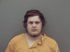 Patricide suspect given $100,000 bond at hearing