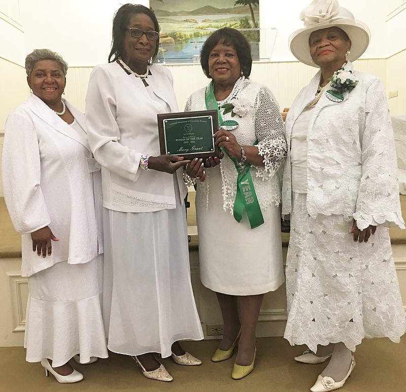The National Association of University Women honors its Woman of the Year. Participants included (from left), Amanda Wells, Chairman Winnie Wilson, Woman of the Year Mary Grant, and Joyce Bracy Vaughan, president of the Pine Bluff NAUW Branch. (Special to The Commercial)
