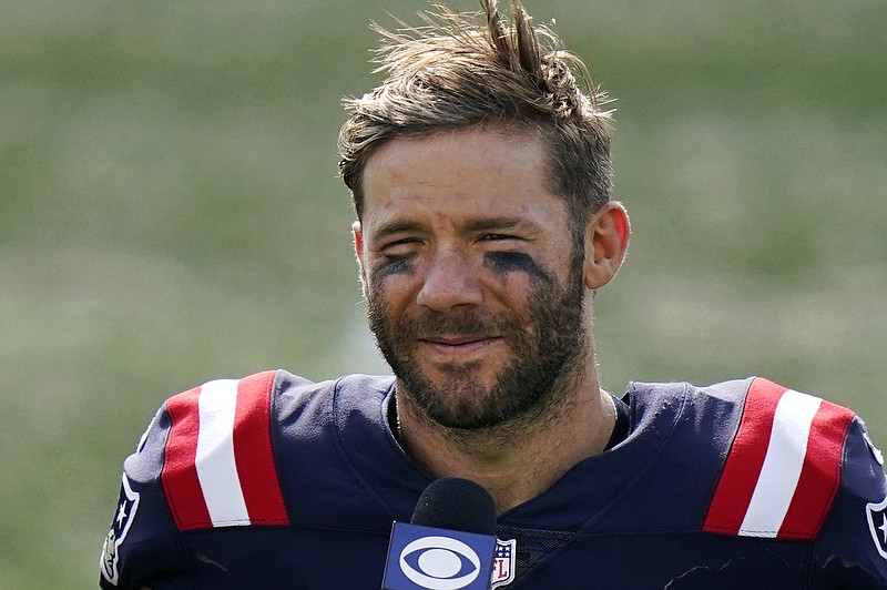 FILE — In this Sunday, Sept. 13, 2020 file photo New England Patriots wide receiver Julian Edelman gives a post-game interview after an NFL football game against the Miami Dolphins, in Foxborough, Mass. The Patriots terminated Edelman's contract with a failed physical designation, Monday, April 12, 2021, according to the NFL's transaction wire. The 34-year-old battled a chronic knee injury for the past two seasons and was limited to six games in 2020. (AP Photo/Steven Senne, File)