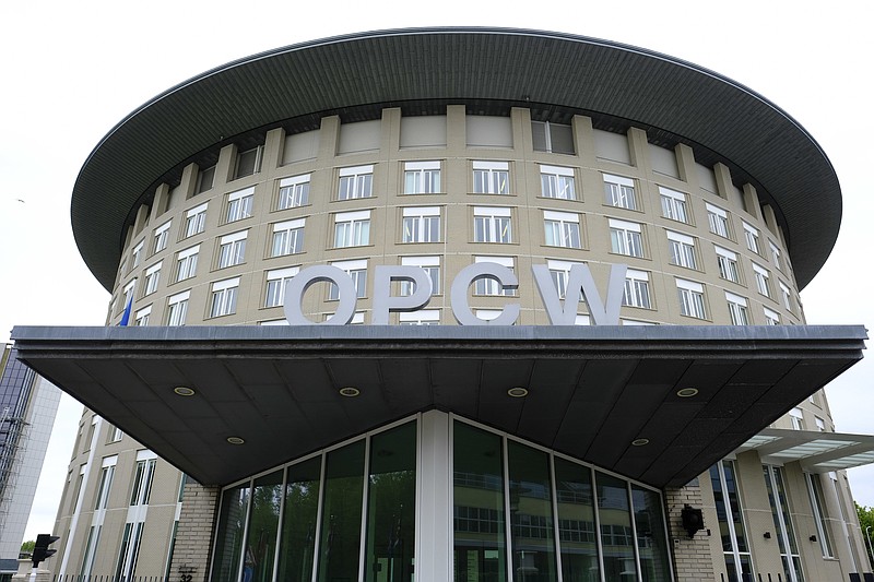 FILE - This Friday May 5, 2017 file photo shows the headquarters of the Organisation for the Prohibition of Chemical Weapons (OPCW), The Hague, Netherlands. An investigation by the global chemical weapons watchdog found “reasonable grounds to believe” that a Syrian air force military helicopter dropped a chlorine cylinder on a Syrian town in 2018, sickening 12 people, the Organization for the Prohibition of Chemical Weapons said Monday, April 12, 2021.(AP Photo/Peter Dejong, File)
