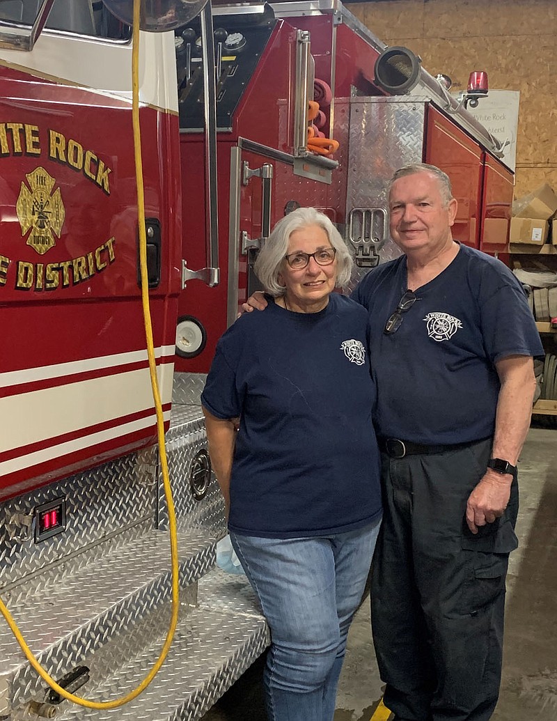 SALLY CARROLL/SPECIAL TO MCDONALD COUNTY PRESS Coleen and Dan Moore, who will celebrate their 50th wedding anniversary in July, volunteer in a variety of ways at the White Rock Fire Department. The two met when they were 16. Coleen came in the gas station to buy ice cream bars for her brothers and sisters. Dan happened to be working in the gas station. Within an hour, Dan found out who the "cute girl" was, went to her house and asked her dad if he could take Coleen on a date.