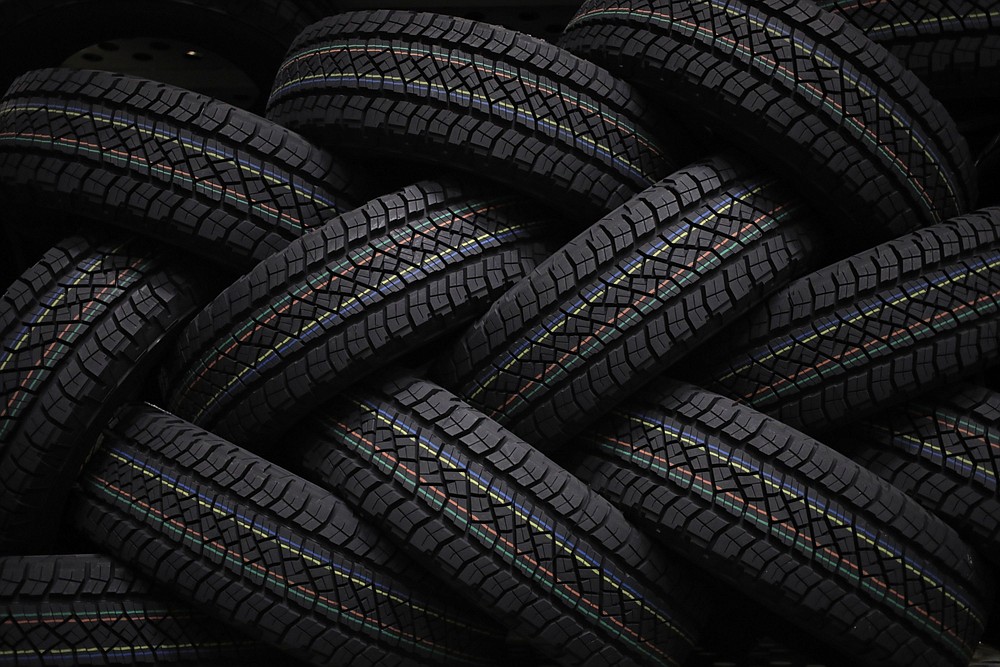 Automotive tires are stacked at the Continental Tire distribution center in Sumter, S.C., on March 23, 2021. MUST CREDIT: Bloomberg photo by Luke Sharrett.