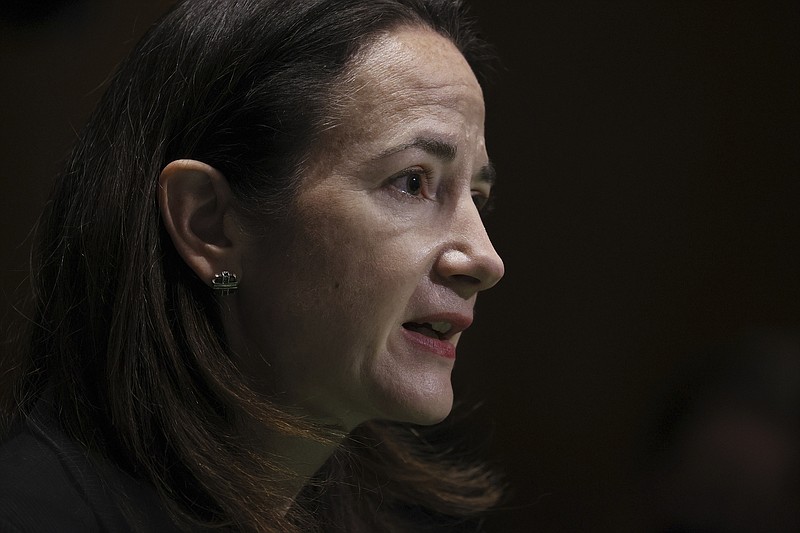 FILE - In this Jan. 19, 2021, file photo, President-elect Joe Biden's pick for national intelligence director Avril Haines speaks during a confirmation hearing before the Senate intelligence committee in Washington. The effects of the coronavirus pandemic are expected to contribute over the next year to “humanitarian and economic crises, political unrest, and geopolitical competition,” according to a new intelligence report that also warns about the threats from foreign adversaries and from violent extremists inside the United States. “The American people should know as much as possible about the threats facing our nation and what their intelligence agencies are doing to protect them,” Haines said. (Joe Raedle/Pool Photo via AP, File)