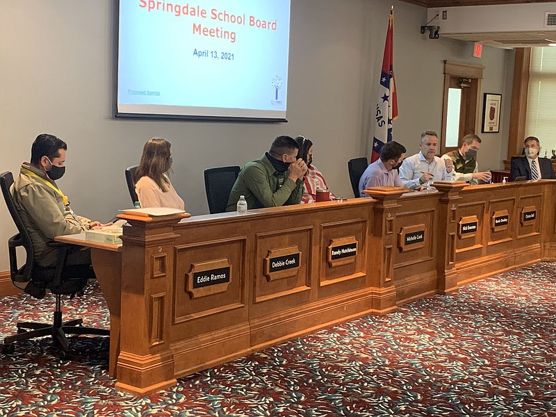 The Springdale School Board discusses the district mask wearing policy Tuesday at its monthly meeting. (NWA Democrat-Gazette/Mary Jordan)