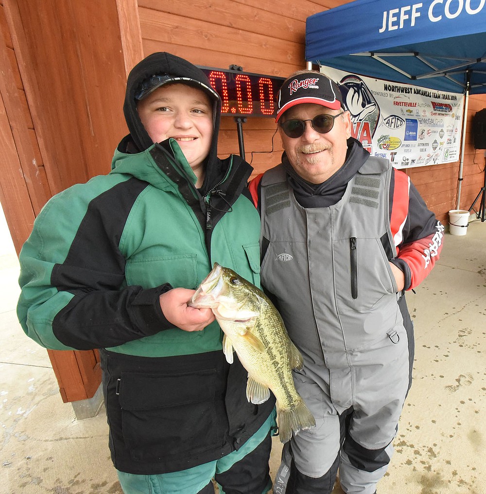 Tournament director Shannan Moseley had tremendous help from his grandson, Bobber Qualls, running the charity tournament.
(NWA Democrat-Gazette/Flip Putthoff)