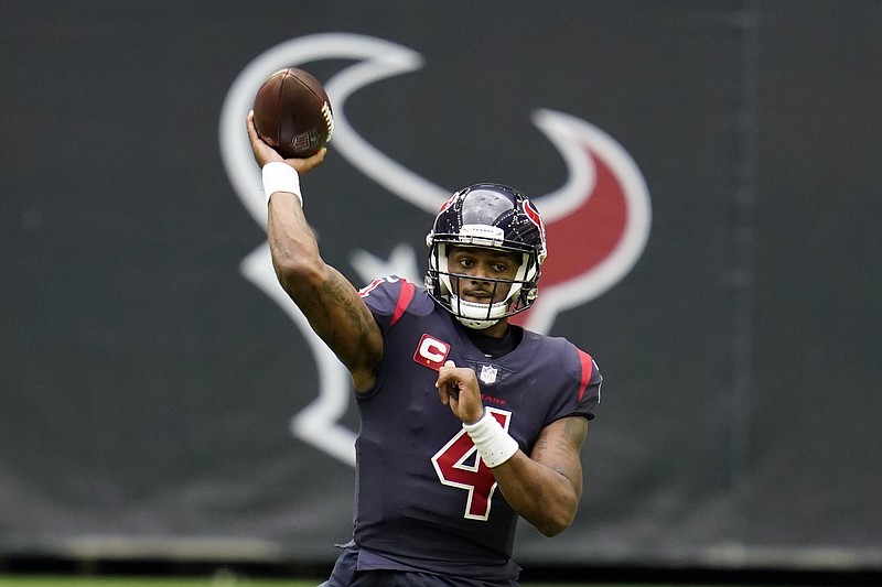 FILE - In this Dec. 27, 2020, file photo, Houston Texans quarterback Deshaun Watson throws a pass during an NFL football game against the Cincinnati Bengals in Houston.  On Friday, April 9, 2021, a judge has ordered that the name of one of the 22 women who have filed lawsuits accusing Watson of sexual assault and harassment must be made public.   (AP Photo/Matt Patterson, File)