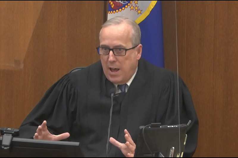In this image from video, Hennepin County Judge Peter Cahill discusses motions before the court Wednesday, April 14, 2021, in the trial of former Minneapolis police Officer Derek Chauvin at the Hennepin County Courthouse in Minneapolis, Minn.  Chauvin is charged in the May 25, 2020 death of George Floyd.  (Court TV via AP, Pool)