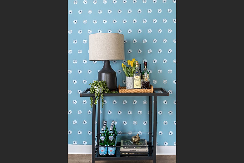 Dot Comb Blue peel-and-stick wallpaper by Chasing Paper. (Anna Spaller via The Washington Post)