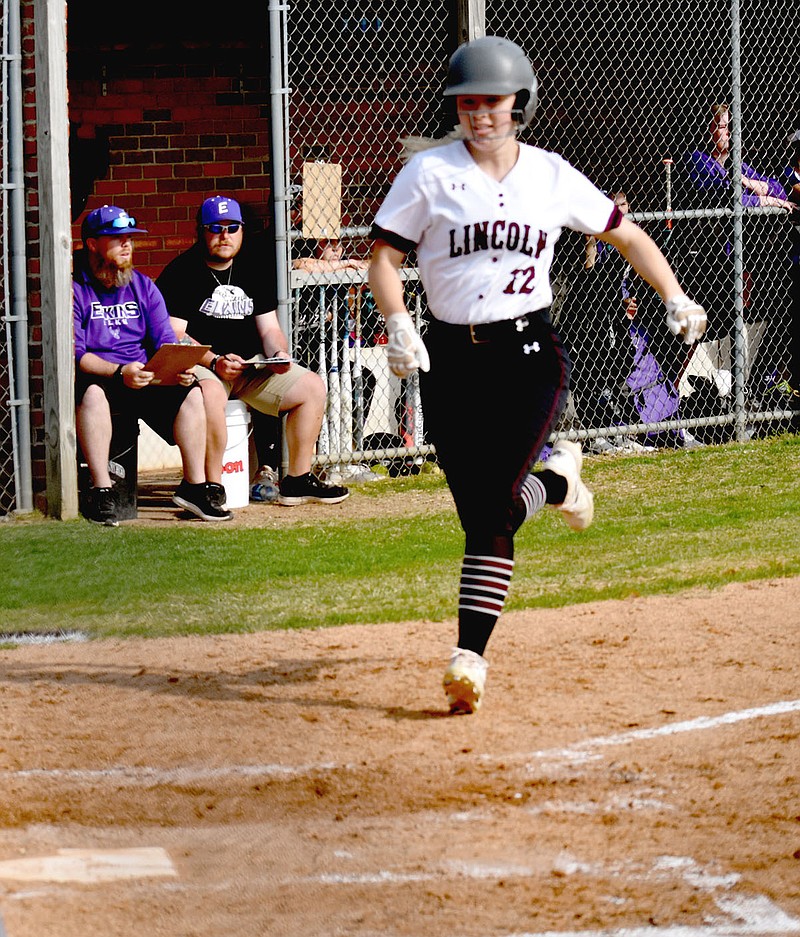 MARK HUMPHREY  ENTERPRISE-LEADER/Lincoln senior Chloe Dawson scores a run in the bottom of the seventh, part of a late rally that sent the Lady Wolves into extra innings before losing 10-5 to Elkins in 3A-1 softball action Tuesday, April 13.