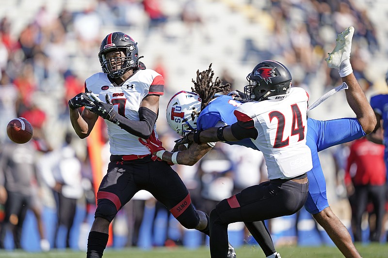 Southeast Missouri State defenders Lawrence Johnson (7) and Shabari Davis (24) break up a pass intended for Tennessee State wide receiver Zaire Thornton during an NCAA college football game Sunday, April 11, 2021, in Nashville, Tenn. Because of COVID-19, the OVC postponed the 2020 season to the spring, and the decision was made to play games on Sunday because member schools needed flexibility to staff all the spring sports. (AP Photo/Mark Humphrey)