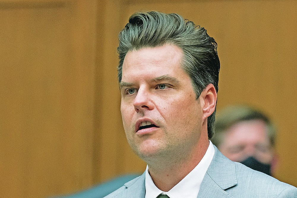 FILE - In this Wednesday, April 14, 2021 file photo, Rep. Matt Gaetz, R-Fla., questions witnesses during a House Armed Services Committee hearing on Capitol Hill, in Washington. On Friday, April 16 The Associated Press reported on stories circulating online incorrectly asserting that a photo showed Gaetz as a senior in high school with a mullet hairstyle and a tuxedo. The image is not genuine. A reverse-image search revealed Gaetz’s face was superimposed onto a different man’s portrait, which has been circulating as a meme online for at least 11 years. (AP Photo/Manuel Balce Ceneta, File)