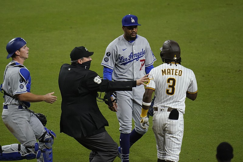 Padres score five in the seventh to upset Dodgers, advance to