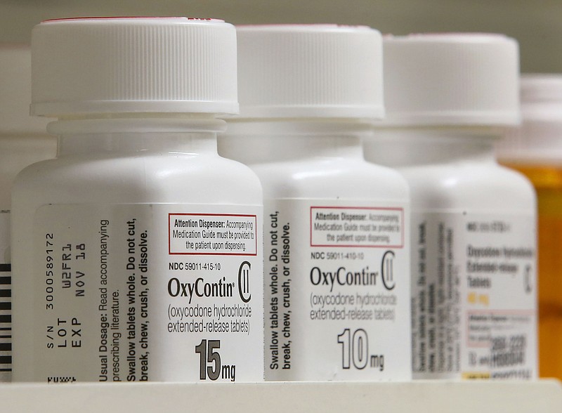Bottles of Purdue Pharma OxyContin medication sit on a pharmacy shelf in Provo, Utah, U.S., on Wednesday, Aug. 31, 2016. MUST CREDIT: Bloomberg photo by George Frey.