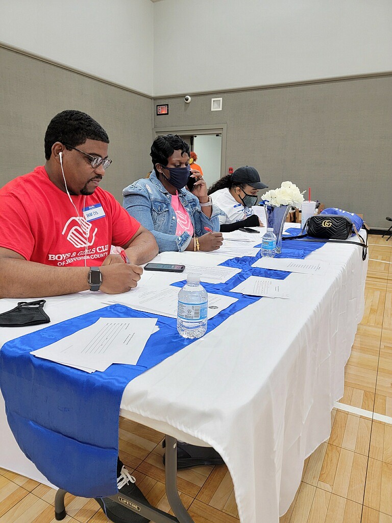 Jefferson County Sheriff Lafayette Woods (from left), Santrice Kerney and Tiffany Ventry were part of an army of 25 volunteers who handled the phones Saturday afternoon for the Boys & Girls Club of Jefferson County two-hour telethon. (Special to The Commercial)
