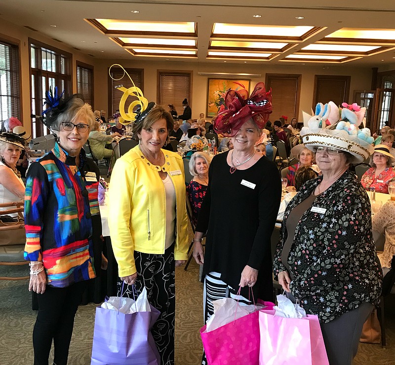 From left are Women's Welcome Club President Regenia Bettis with hat winners Carolyn Spainhouer, Cathy Wolf and Barbara Henry. - Submitted photo