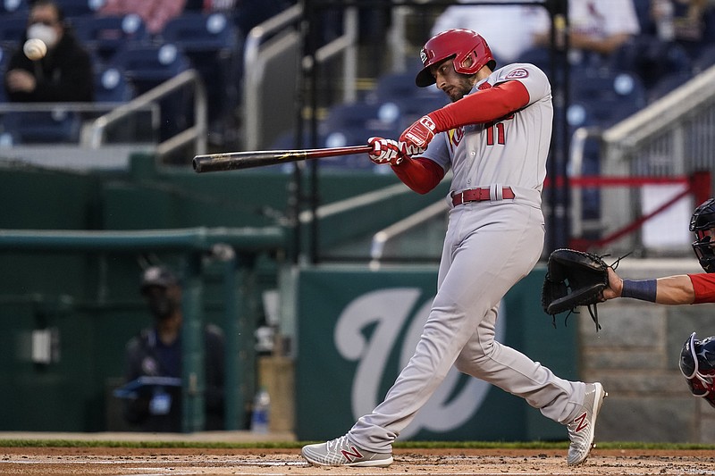 St Louis Cardinals' Paul DeJong hits a solo home run during the second inning of a baseball game against the Washington Nationals at Nationals Park, Monday, April 19, 2021, in Washington. (AP Photo/Alex Brandon)