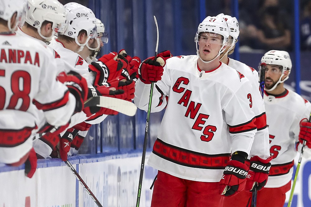 Carolina Hurricanes' Andrei Svechnikov (37), of Russia, celebrates his goal against the Tampa Bay Lightning during the second period of an NHL hockey game Monday, April 19, 2021, in Tampa, Fla. (AP Photo/Mike Carlson)