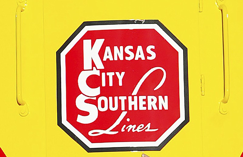 FILE - In this Nov. 5, 2004 file photo, the logo of Kansas City Southern is down on a restored 1954 Kansas City Southern passenger locomotive at Union Station in Kansas City, Mo.  A bidding war is breaking out for Kansas City Southern, with Canadian National Railway making a $33.7 billion cash-and-stock offer for the railway. The bid trumps a $25 billion cash-and-stock proposal made by Canadian Pacific last month. Shares of Kansas City Southern jumped more than 18% in Tuesday, April 20, 2021 premarket trading.(Norman Ng/The Kansas City Star via AP)