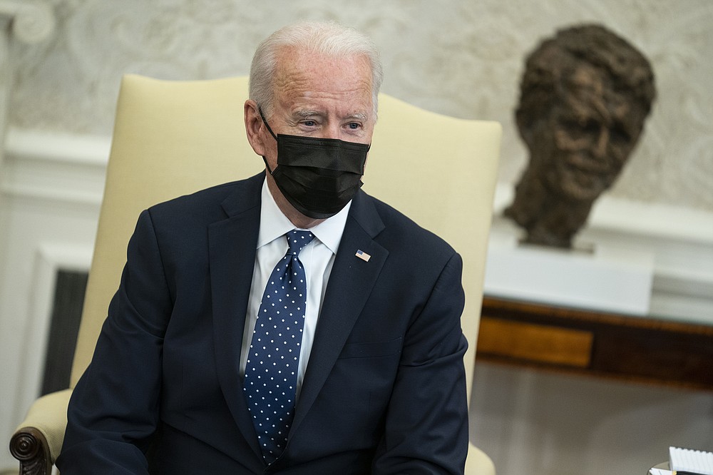 President Joe Biden speaks during a meeting with members of the Congressional Hispanic Caucus, in the Oval Office of the White House, Tuesday, April 20, 2021, in Washington. (AP Photo/Evan Vucci)