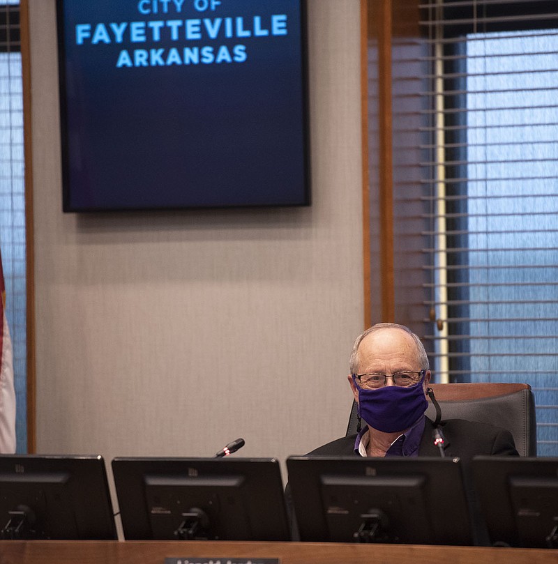 Fayetteville mayor Lioneld Jordan smiles Tuesday during a Fayetteville City Council meeting. The council held its first meeting in-person since March 2020, when the covid-19 pandemic prompted closings globally. Among items on the agenda were regulations for short-term rentals and some rezoning requests. Go to nwaonline.com/2100421Daily/ and nwadg.com/photo. 
(NWA Democrat-Gazette/J.T. Wampler)