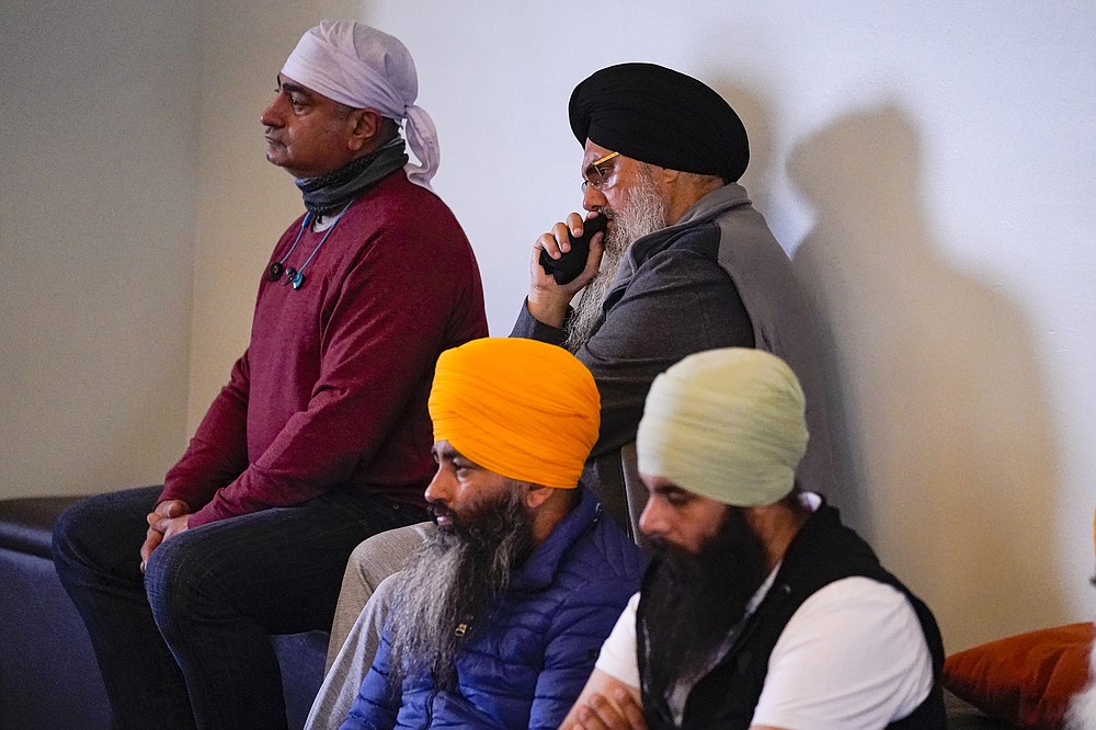 Members of the Sikh Coalition gather at the Sikh Satsang of Indianapolis on April 17 to formulate the groups response to the shooting at a FedEx facility in Indianapolis last week that claimed the lives of four members of the Sikh community.
(AP/Michael Conroy)