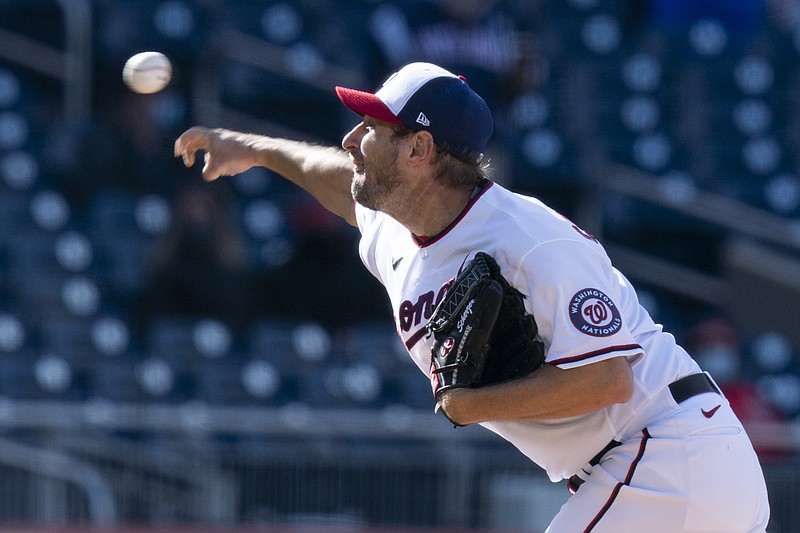 Washington Nationals starting pitcher Max Scherzer (31), throws during the third inning of a baseball game against the St. Louis Cardinals in Washington, Wednesday, April 21, 2021. (AP Photo/Manuel Balce Ceneta)