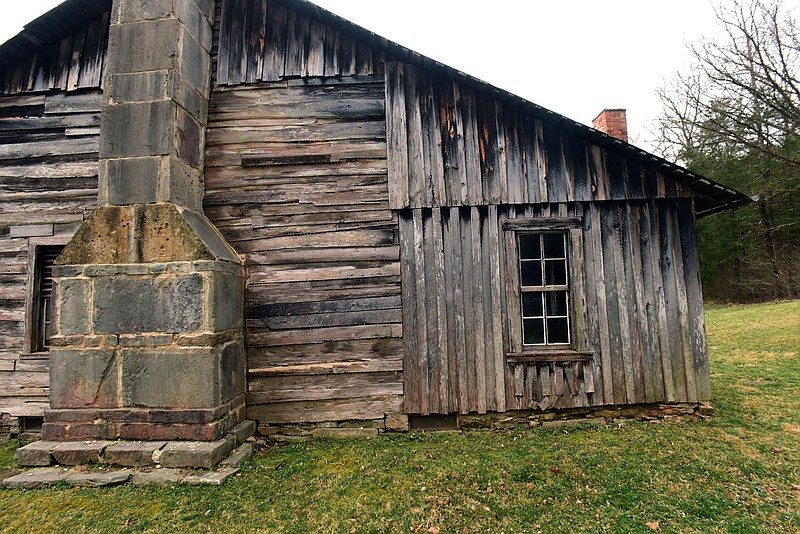 An addition (right) was built on to the original log home.
(NWA Democrat-Gazette/Flip Putthoff)