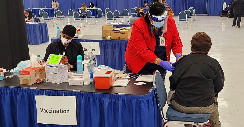 The City of Pine Bluff in association with Doctor's Orders Pharmacy, will hold another mass vaccination clinic on Friday, April 30, from 8 a.m. to 6 p.m. at the Pine Bluff Convention Center. Shown here is a previous vaccination clinic at the convention center. (Pine Bluff Commercial/Eplunus Colvin)