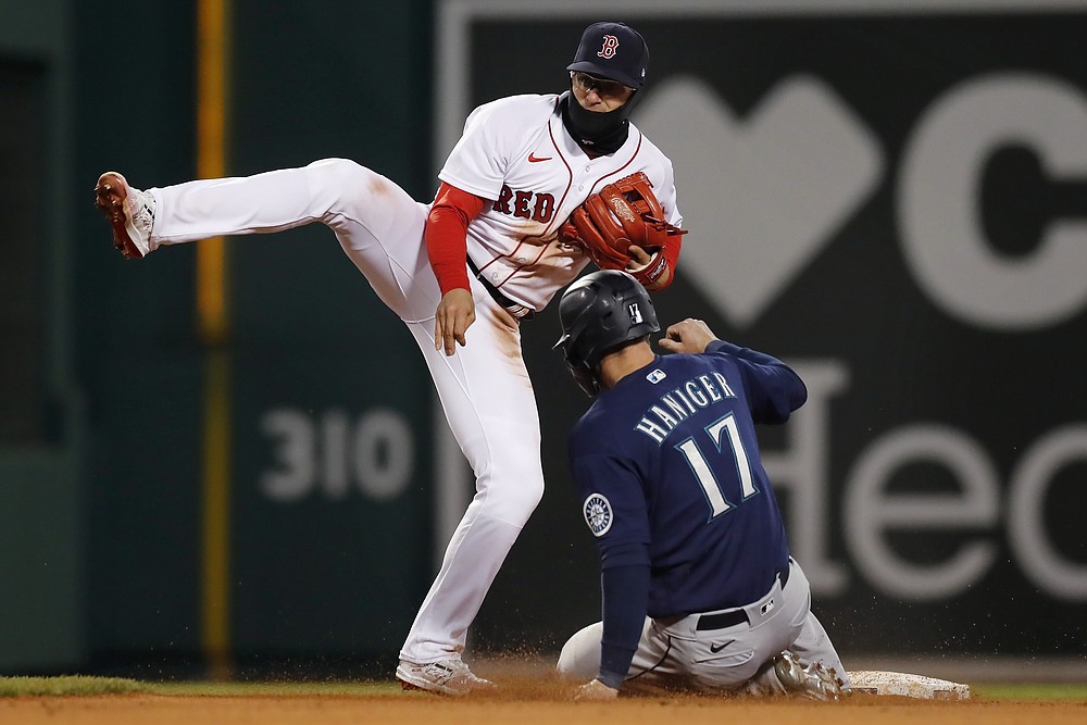 Peralta drives in 7 to take down Reds