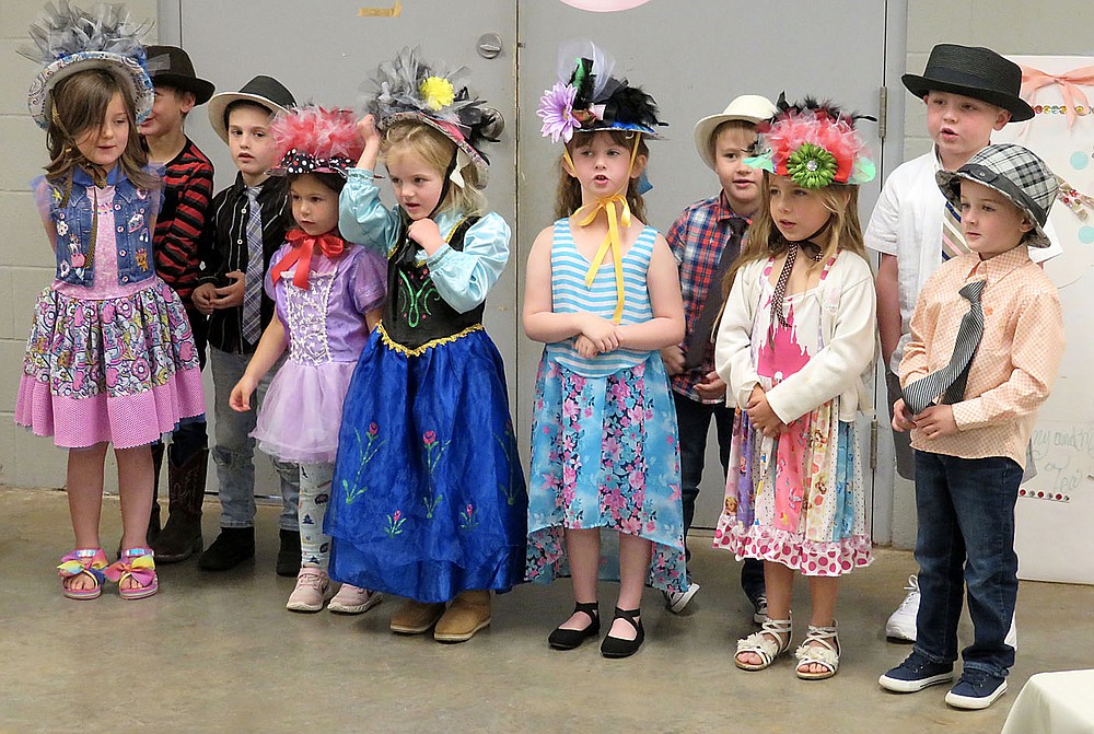 Westside Eagle Observer/RANDY MOLL
Young students sang "You Are My Sunshine" to their mothers at the Mommy and Me Tea Party held at the Gentry Early Learning Academy on Friday.