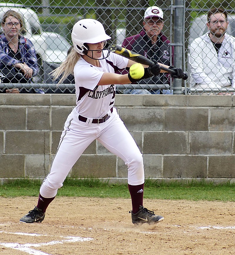 Westside Eagle Observer/RANDY MOLL
Gentry's Liberty Brannon puts down a bunt during play against Van Buren at the Merrill Reynolds Memorial Complex at Gentry High School on Thursday.