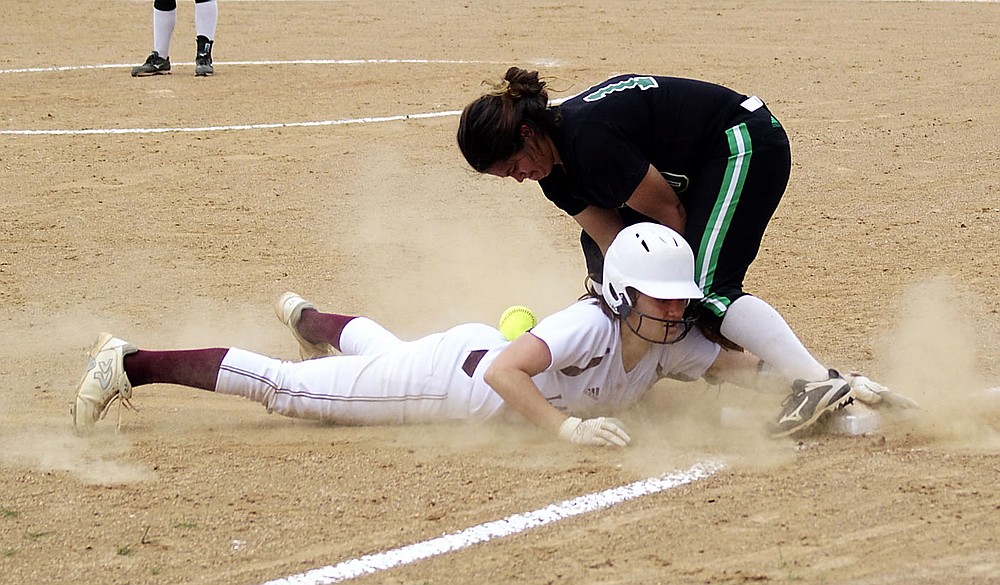 Westside Eagle Observer/RANDY MOLL
Gentry's Malea Wilson slides into third base and knocks the ball loose during play against Van Buren at the Merrill Reynolds Memorial Complex at Gentry High School on Thursday.