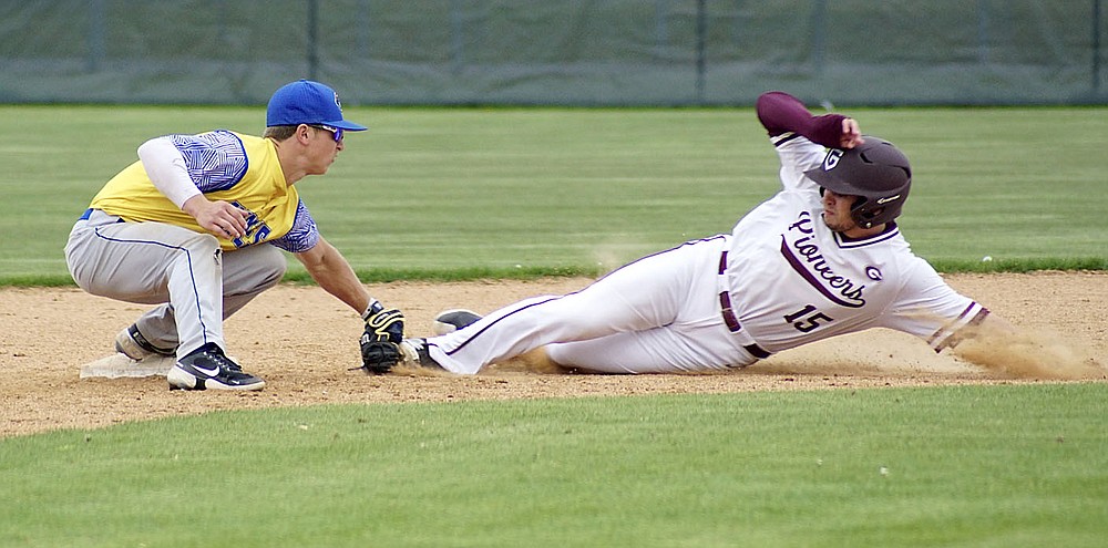 Westside Eagle Observer/RANDY MOLL
Gentry's Jonathan Corter slides into the Cedarville tag in an attempt to steal second base at the Merrill Reynolds Memorial Complex at Gentry High School on Thursday.