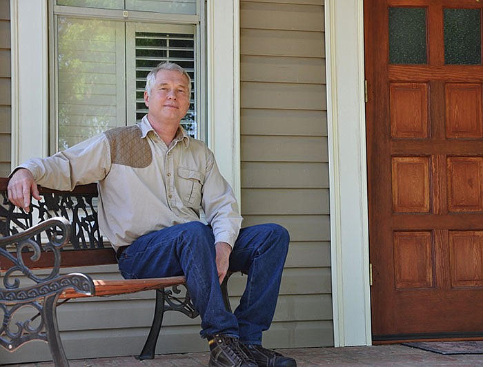 David Benson, pastor of New Prospect Landmark Missionary Baptist Church in Sulphur Rock, stands in front of his home in near Tuckerman, Ark. on Monday, April 19. Benson said he would not encourage members of his congregation to get vaccinated for the coronavirus. (Arkansas Democrat-Gazette/Lara Farrar)