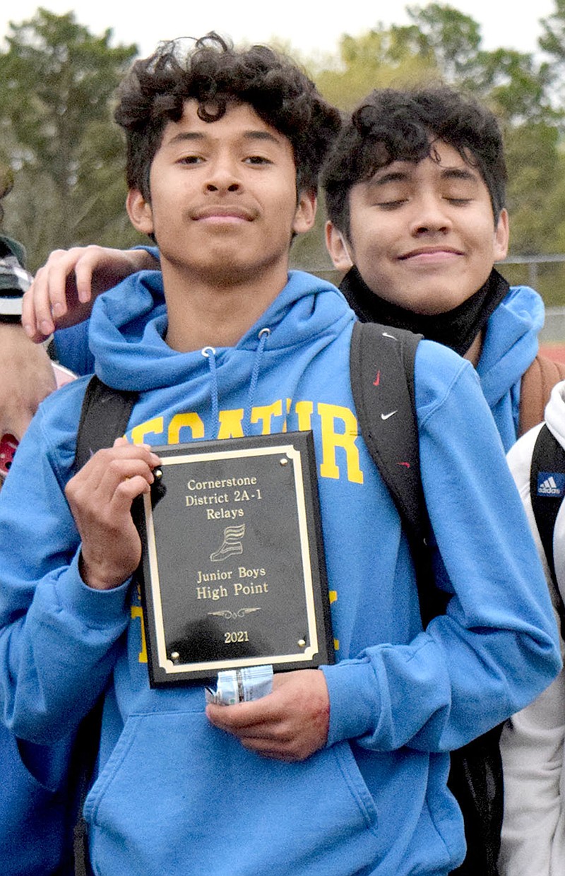 Westside Eagle Observer/MIKE ECKELS

Decatur's Brian Ruiz proudly displays his Individual high point leader plaque he earned during the 2A-1 junior high district track meet in Eureka Springs Friday afternoon. Ruiz took five first and one second place medal for a total of 59 points.