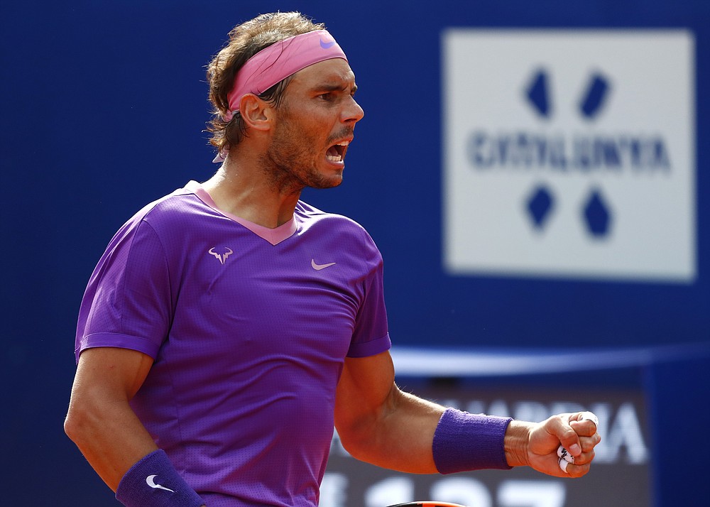 Rafael Nadal of Spain reacts during the final Godo tennis tournament against Stefanos Tsitsipas of Greece in Barcelona, Spain, Sunday, April 25, 2021. (AP Photo/Joan Monfort)