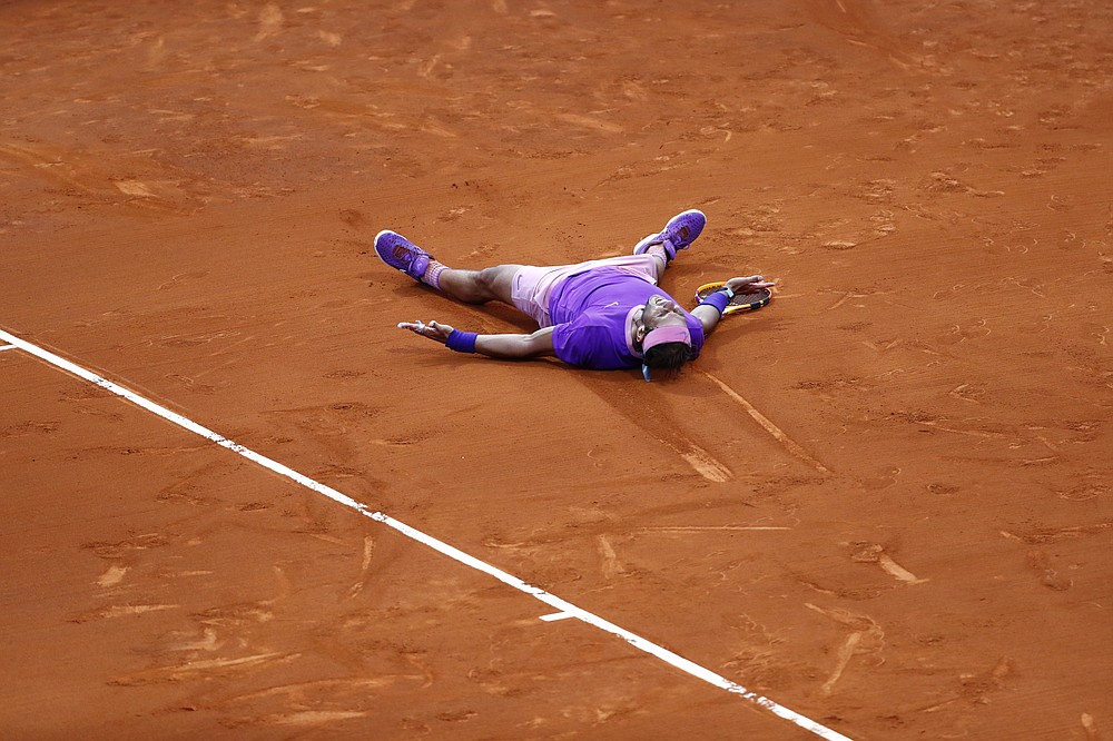 Rafael Nadal of Spain reacts after winning the final Godo tennis tournament against Stefanos Tsitsipas of Greece in Barcelona, Spain, Sunday, April 25, 2021. Nadal won by 6-4, 6-7, 7-5 (AP Photo/Joan Monfort)