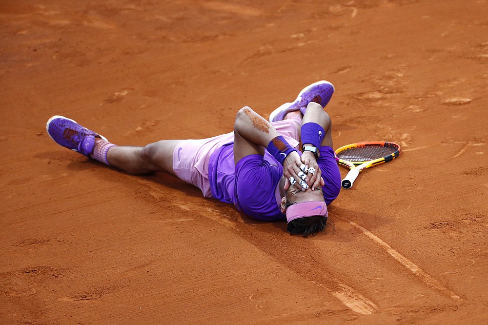Rafael Nadal of Spain reacts after winning the final Godo tennis tournament against Stefanos Tsitsipas of Greece in Barcelona, Spain, Sunday, April 25, 2021. Nadal won by 6-4, 6-7, 7-5 (AP Photo/Joan Monfort)