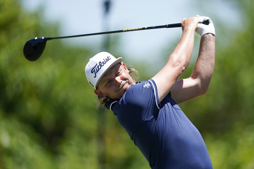 Cameron Smith, of Australia, hits off the second tee during the final round of the PGA Zurich Classic golf tournament at TPC Louisiana in Avondale, La., Sunday, April 25, 2021. (AP Photo/Gerald Herbert)