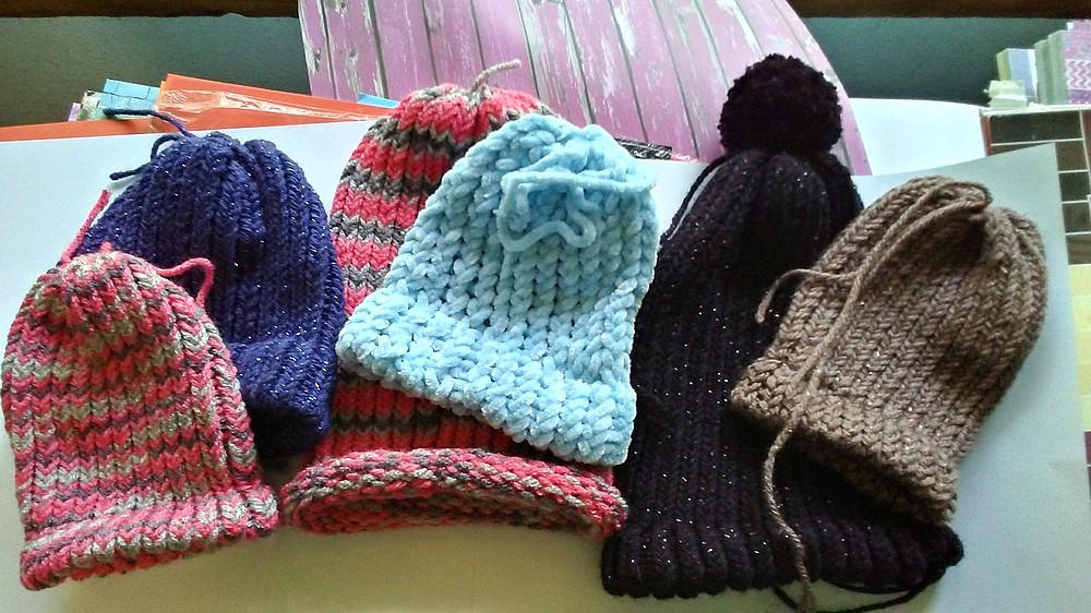 Group prepares hat, doll donation