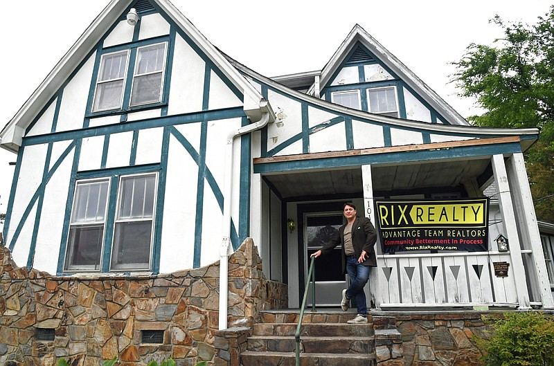 Local Realtor Chris Rix stands on the porch of one of former President Bill Clinton’s boyhood homes in Hot Springs. Rix recently bought the house at 1011 Park Ave., and intends to open it for tours. - Photo by Tanner Newton of The Sentinel-Record