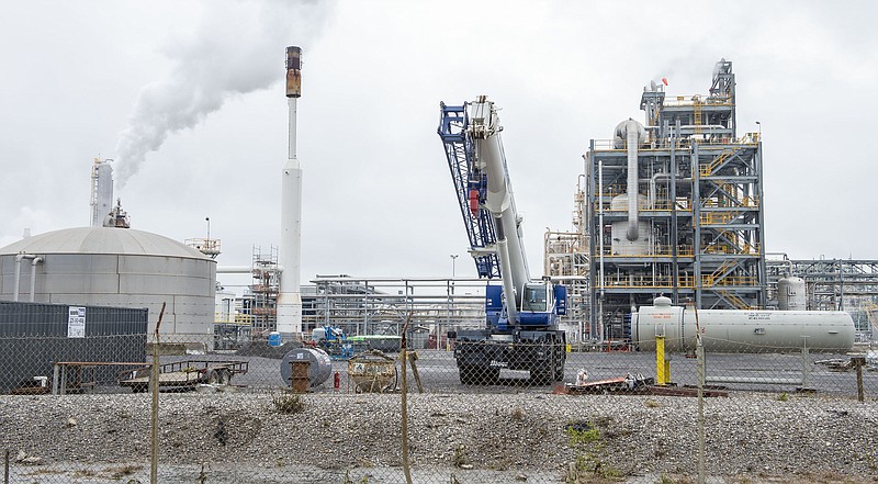 This April 16, 2021 photo shows the Nutrien PCS Nitrogen plant in Geismar, La. The Louisiana fertilizer plant says it can treat contaminated and highly acidic wastewater to drinking-water standards, and wants a state permit to discharge treated water into the Mississippi River — the drinking water source for New Orleans and other downriver communities. (Bill Feig/The Advocate via AP)